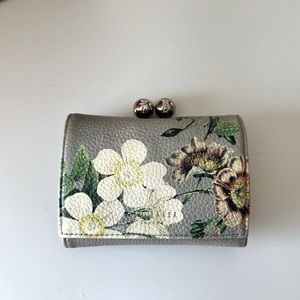 Ted Baker wallet with kids closure in good used condition